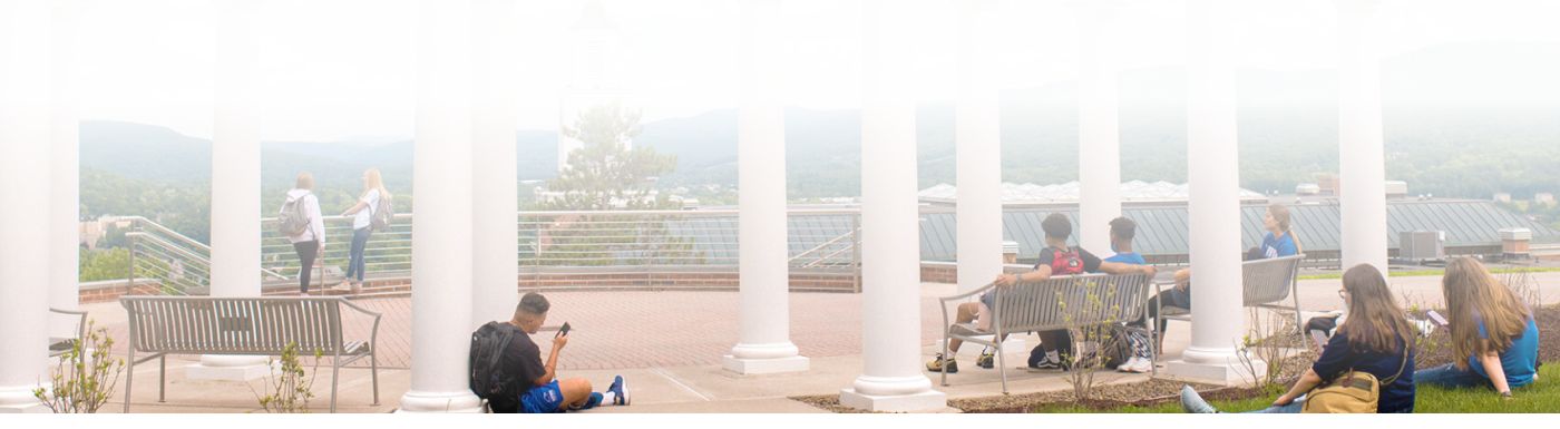 students sitting on campus